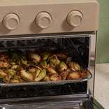 air frying brussell sprouts in beige wonder oven