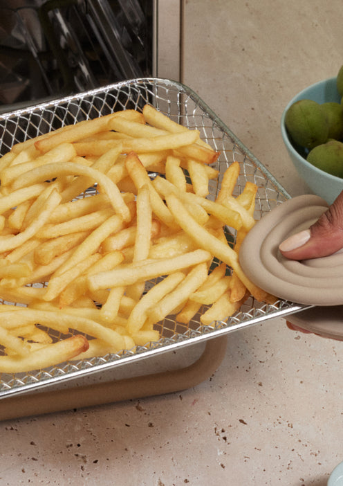 air frying french fries in beige wonder oven