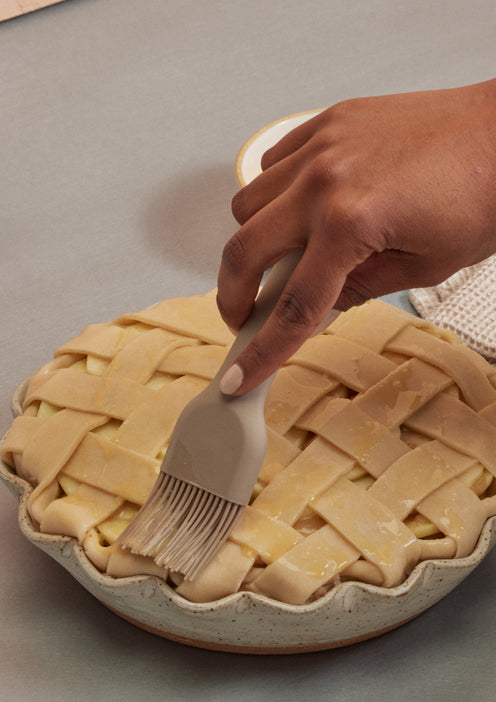 using basting brush on pie