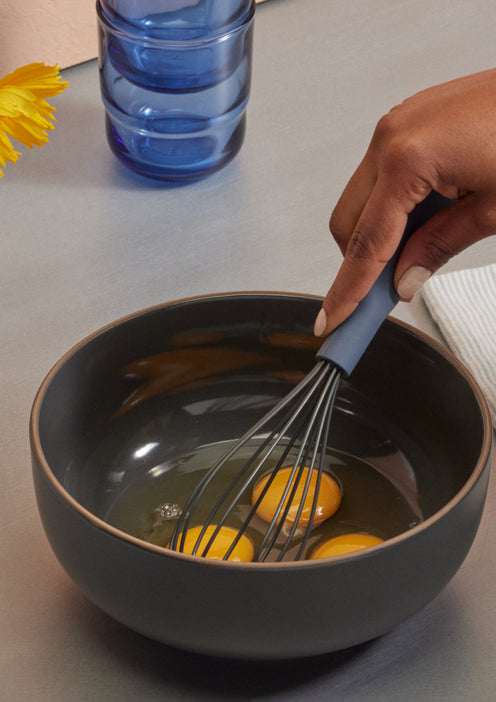 scrambling eggs with whisk