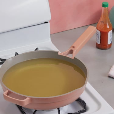 Frying chicken in a pink Large Always Pan