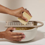 beige better bowl grating cheese