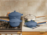 blue salt perfect pot, mini perfect pot, mini always and titanium always pan pro on stove