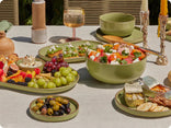 green our place dinnerware assortment serving food on table