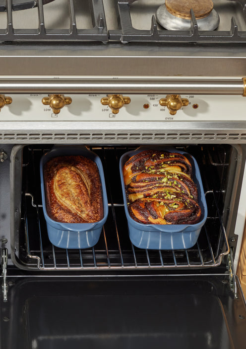 baking bread in blue bakers in oven