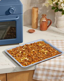 Almond and Fruit Granola on blue large wonder oven tray