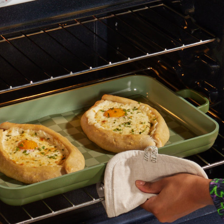 baking pastry on green griddle pan in oven