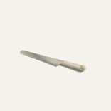 beige serrated knife