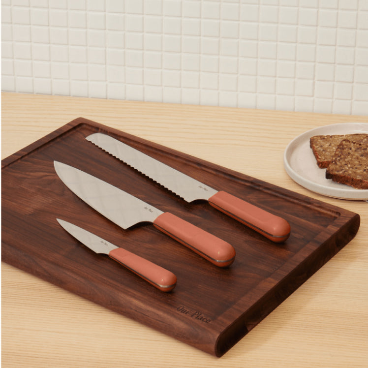 Pink Knife Trio on top of the Walnut Cutting Board