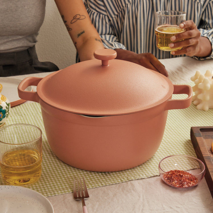 Serving a meal in a pink Perfect Pot on the table