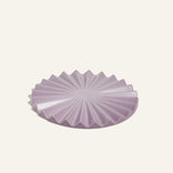 purple pleat trivet