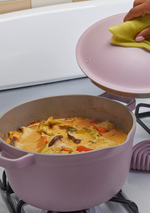 Soup cooking in a purple Perfect Pot on the stove