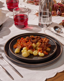 oxtail ragu on salad plate