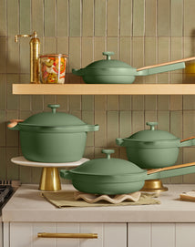 sage cookware set on counter