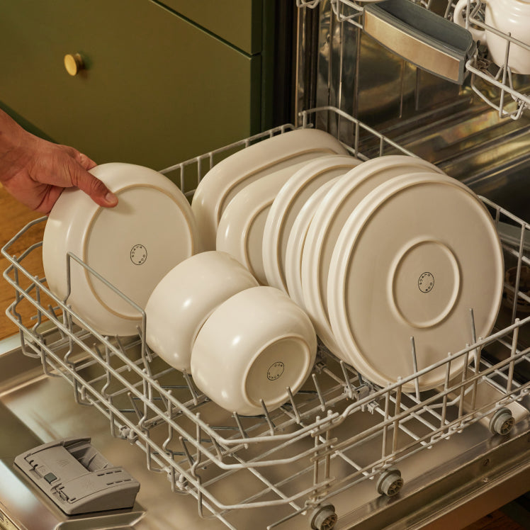 White dinnerware in dishwasher